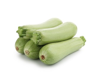 Photo of Many fresh ripe zucchinis isolated on white