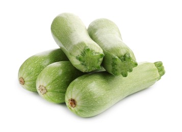 Photo of Many fresh ripe zucchinis isolated on white