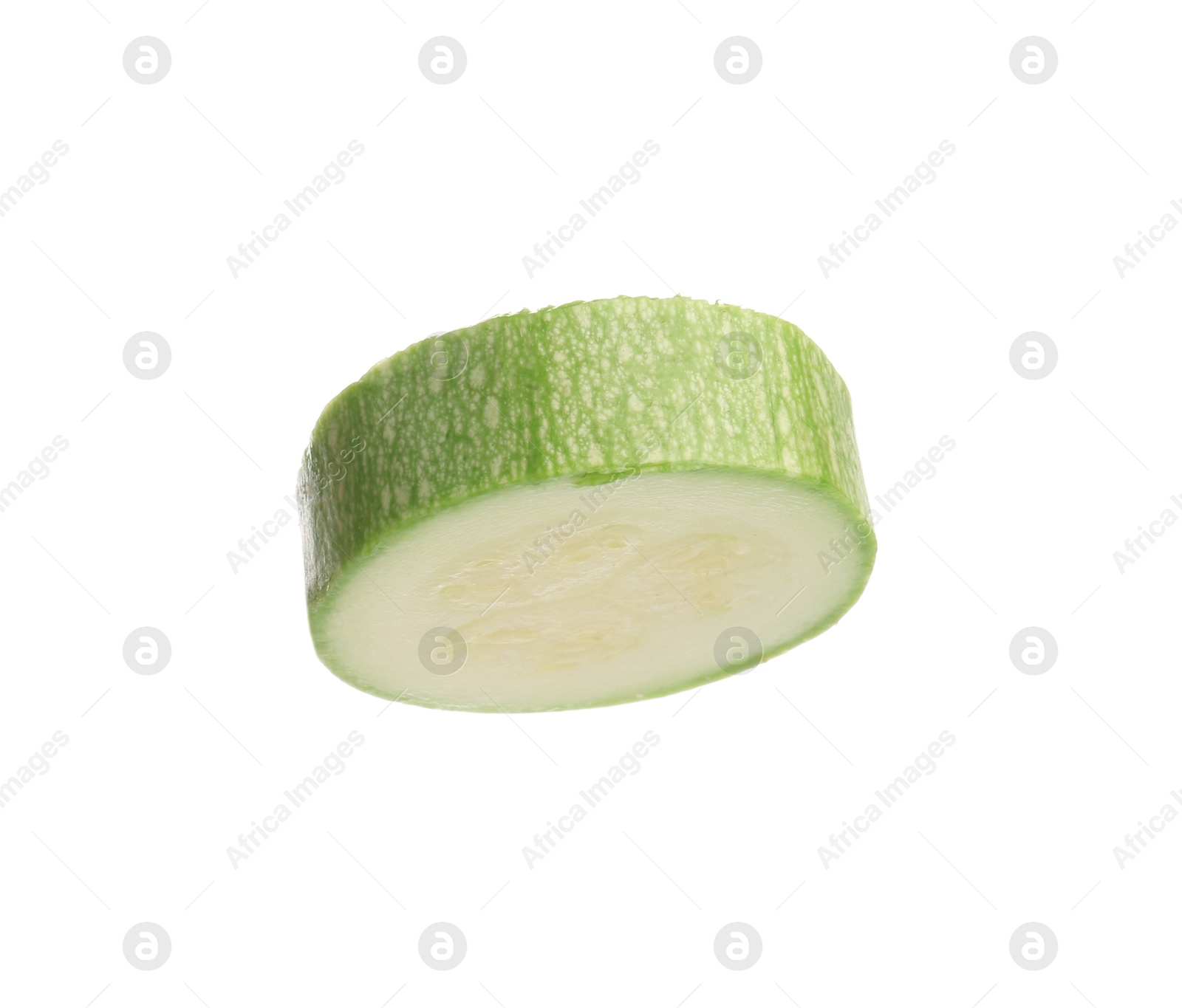 One slice of fresh zucchini isolated on white Photo of One slice of fresh zucchini isolated on white