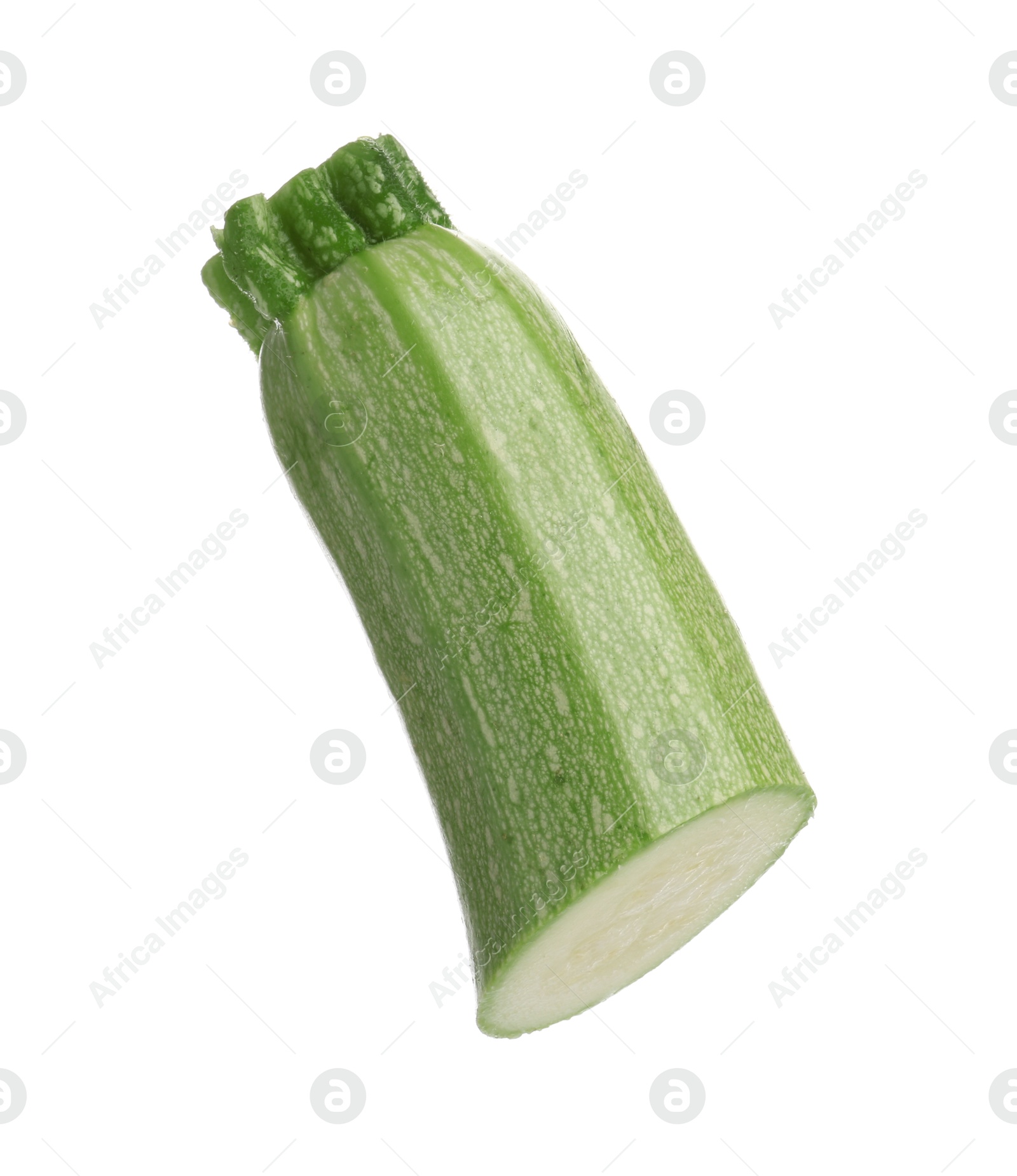 One piece of fresh zucchini isolated on white Photo of One piece of fresh zucchini isolated on white
