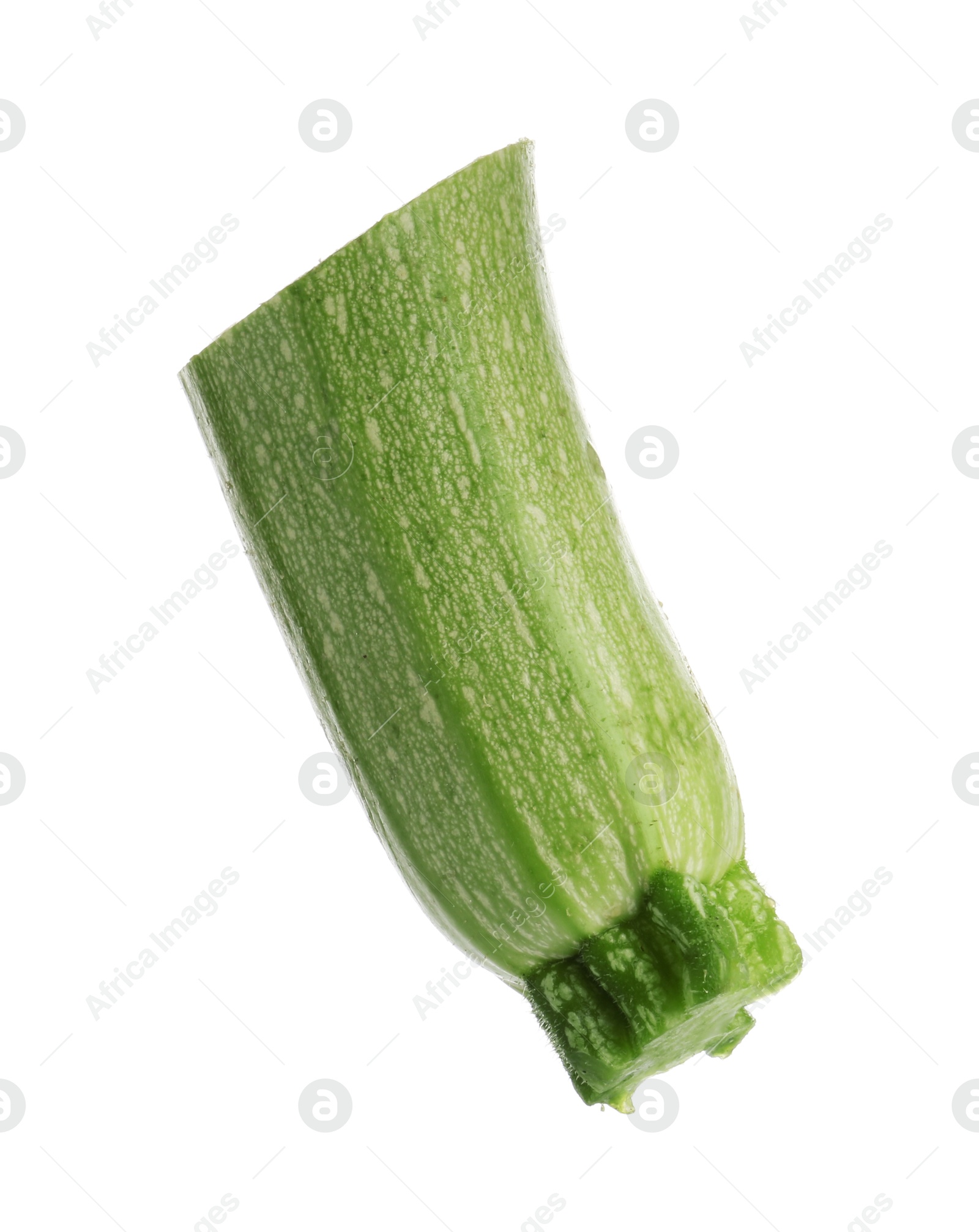 One piece of fresh zucchini isolated on white Photo of One piece of fresh zucchini isolated on white