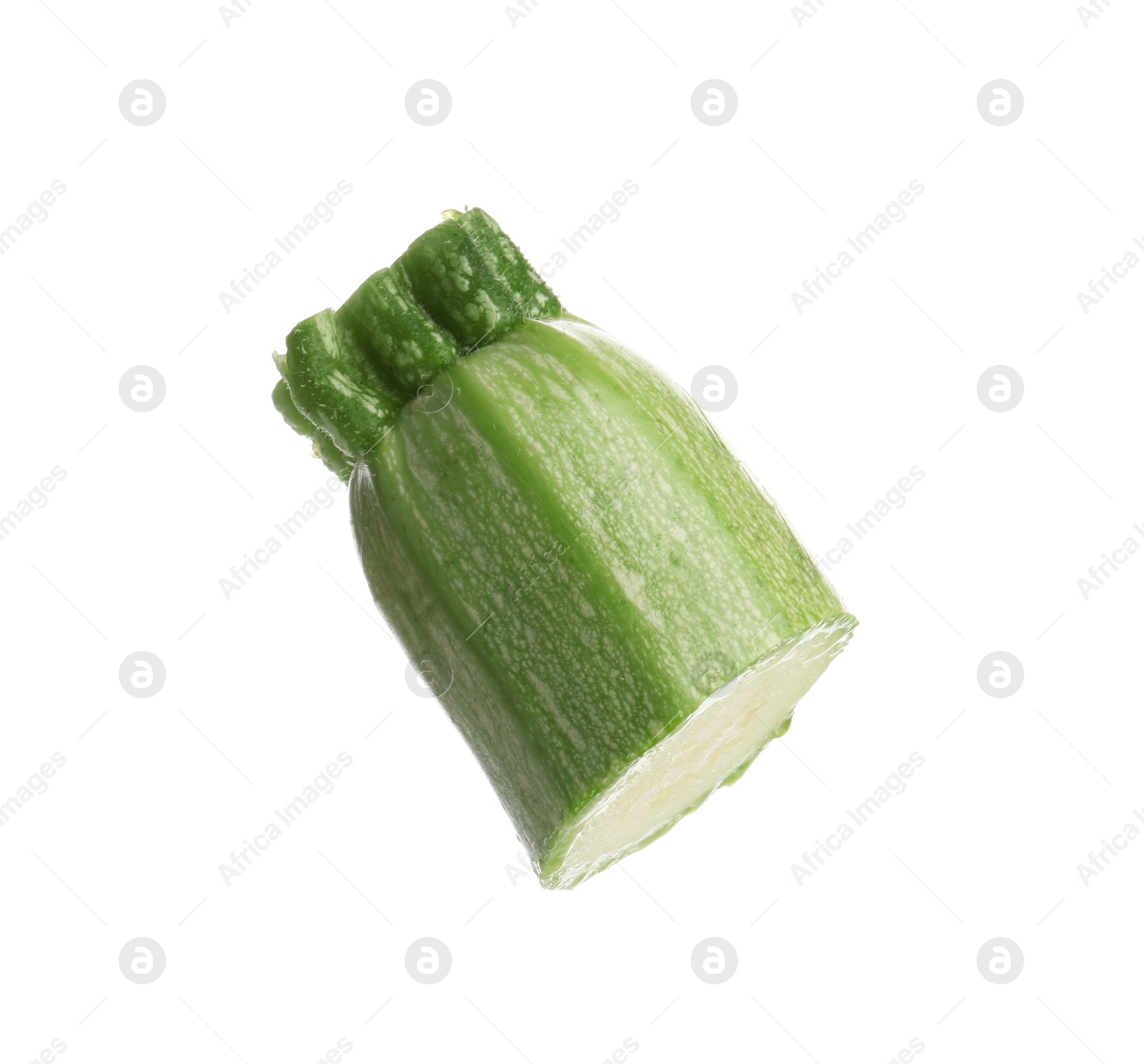 One piece of fresh zucchini isolated on white Photo of One piece of fresh zucchini isolated on white
