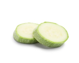 Photo of Slices of fresh zucchini isolated on white