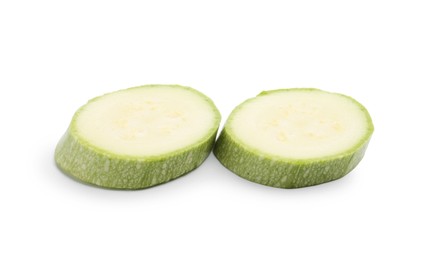 Photo of Slices of fresh zucchini isolated on white