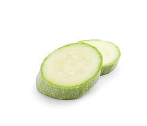 Photo of Slices of fresh zucchini isolated on white