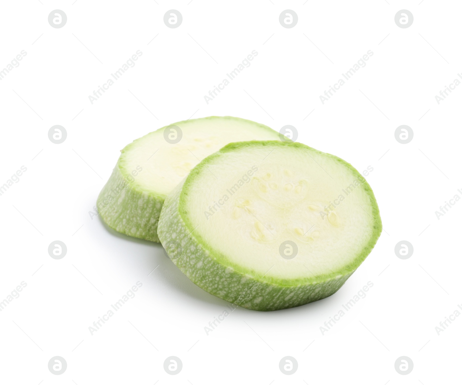 Slices of fresh zucchini isolated on white Photo of Slices of fresh zucchini isolated on white