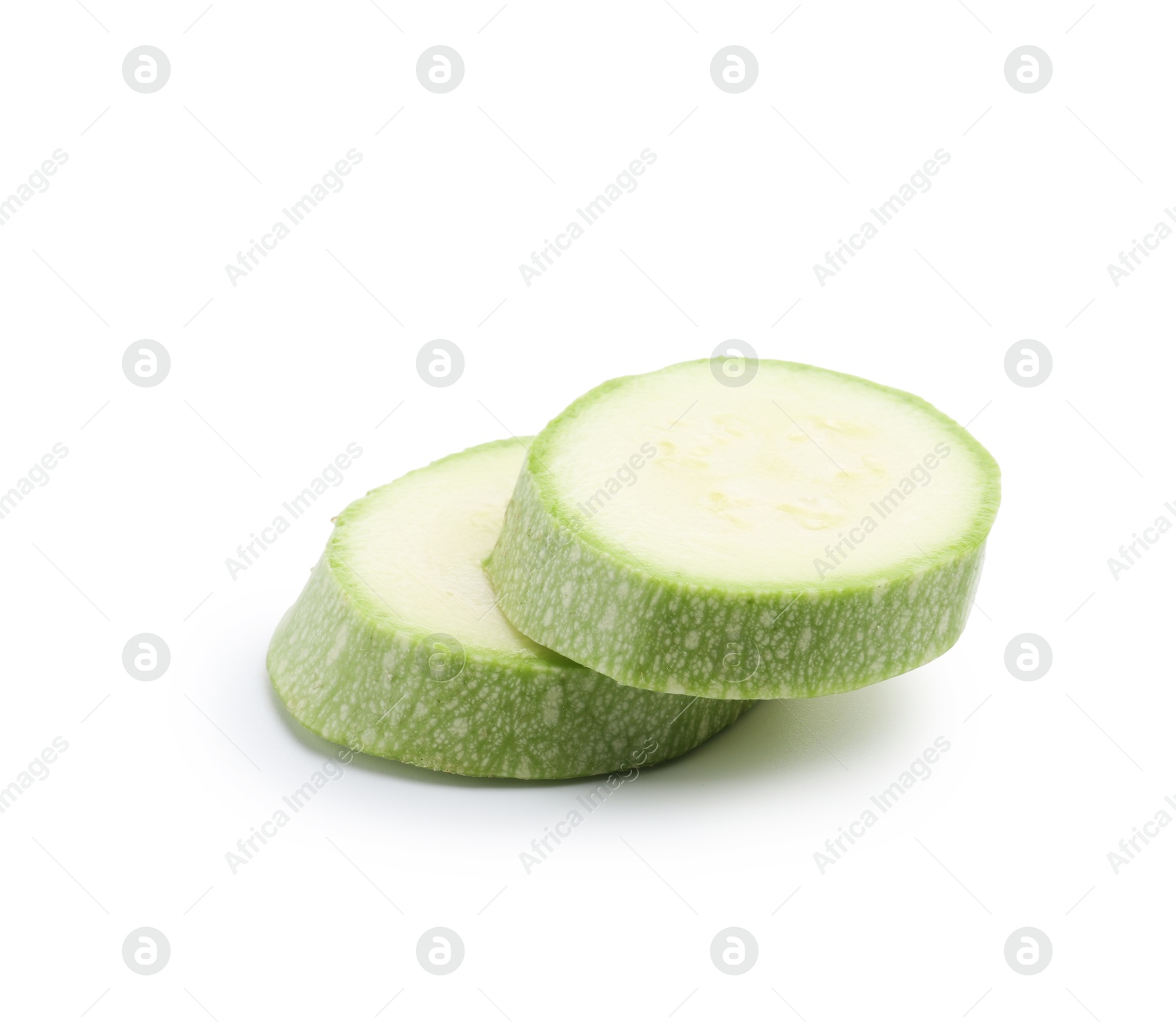Slices of fresh zucchini isolated on white Photo of Slices of fresh zucchini isolated on white