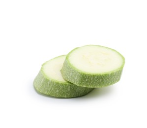 Photo of Slices of fresh zucchini isolated on white