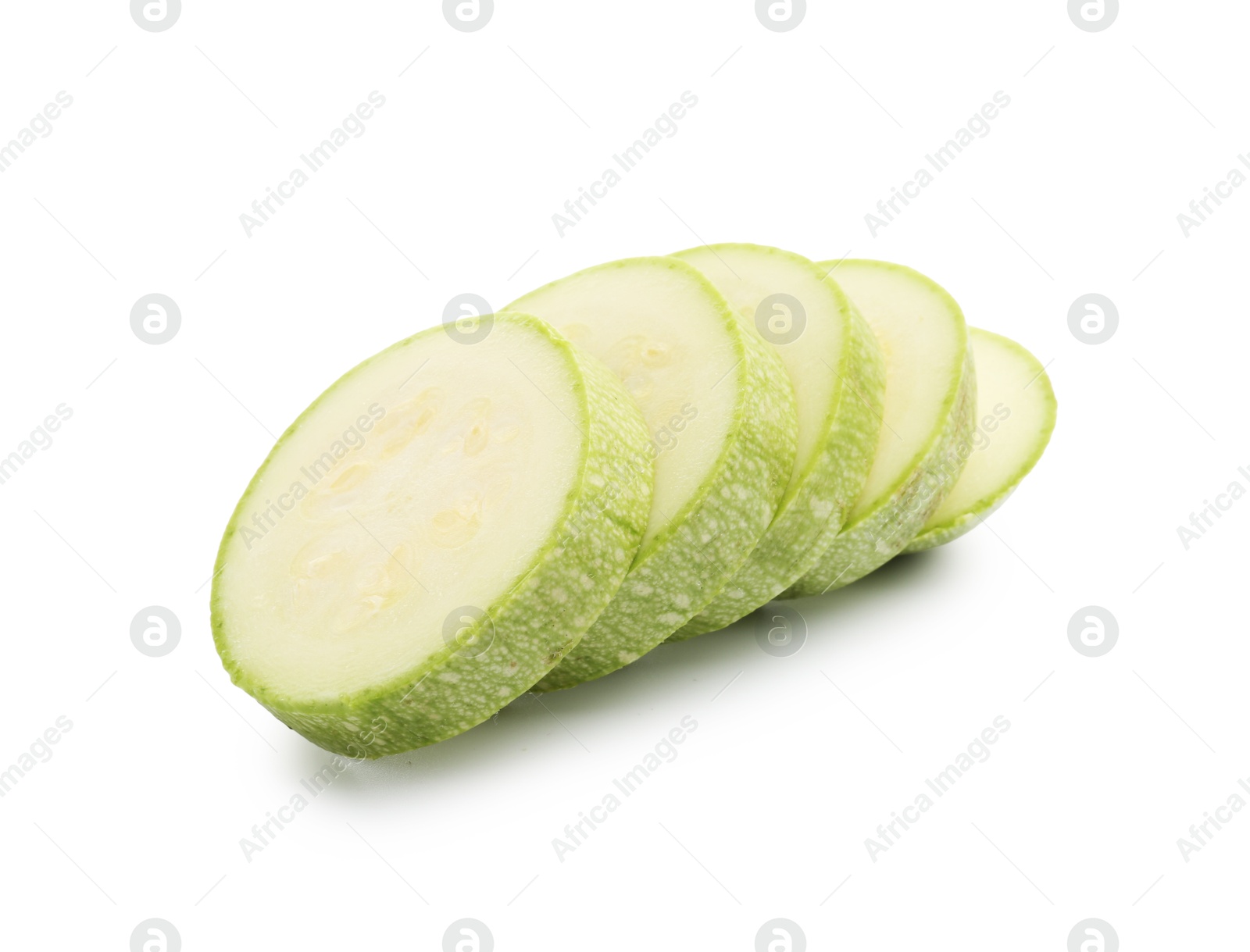 Slices of fresh zucchini isolated on white Photo of Slices of fresh zucchini isolated on white