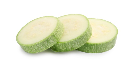 Photo of Slices of fresh zucchini isolated on white