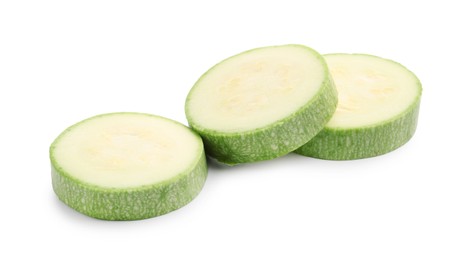 Photo of Slices of fresh zucchini isolated on white