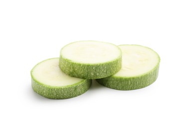 Photo of Slices of fresh zucchini isolated on white