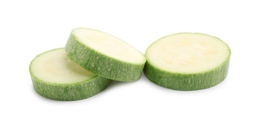 Photo of Slices of fresh zucchini isolated on white