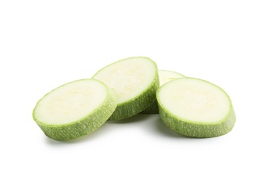 Photo of Slices of fresh zucchini isolated on white
