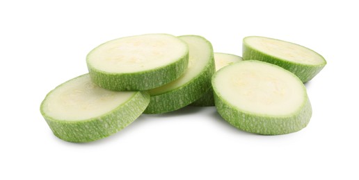 Photo of Slices of fresh zucchini isolated on white