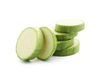Photo of Slices of fresh zucchini isolated on white