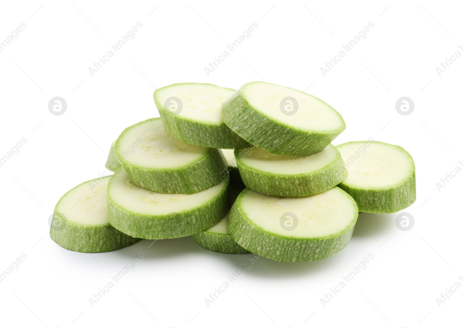 Slices of fresh zucchini isolated on white Photo of Slices of fresh zucchini isolated on white