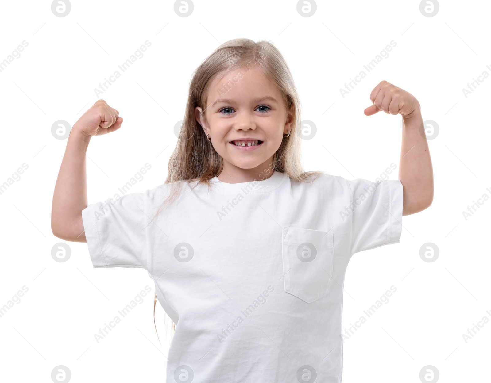 Strength. Happy little girl showing her biceps on white background Photo of Strength. Happy little girl showing her biceps on white background