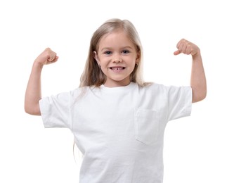 Photo of Strength. Happy little girl showing her biceps on white background