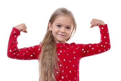 Photo of Strength. Happy little girl showing her biceps on white background