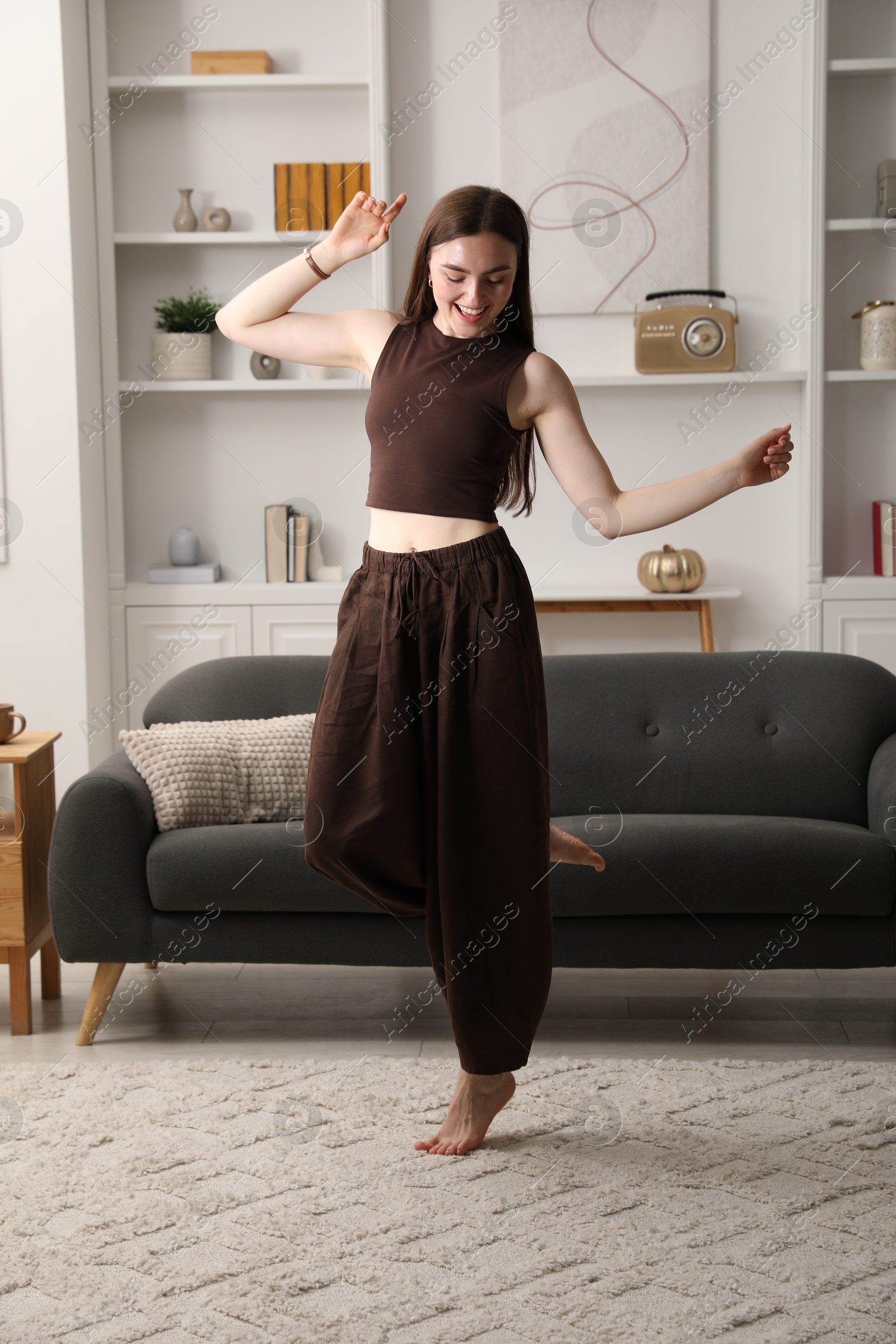 Portrait of beautiful young woman at home Photo of Portrait of beautiful young woman at home