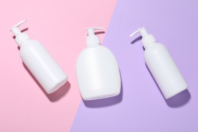 Photo of Cosmetic products on color background, flat lay. Mockup for design
