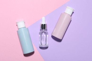 Photo of Cosmetic products on color background, flat lay. Mockup for design