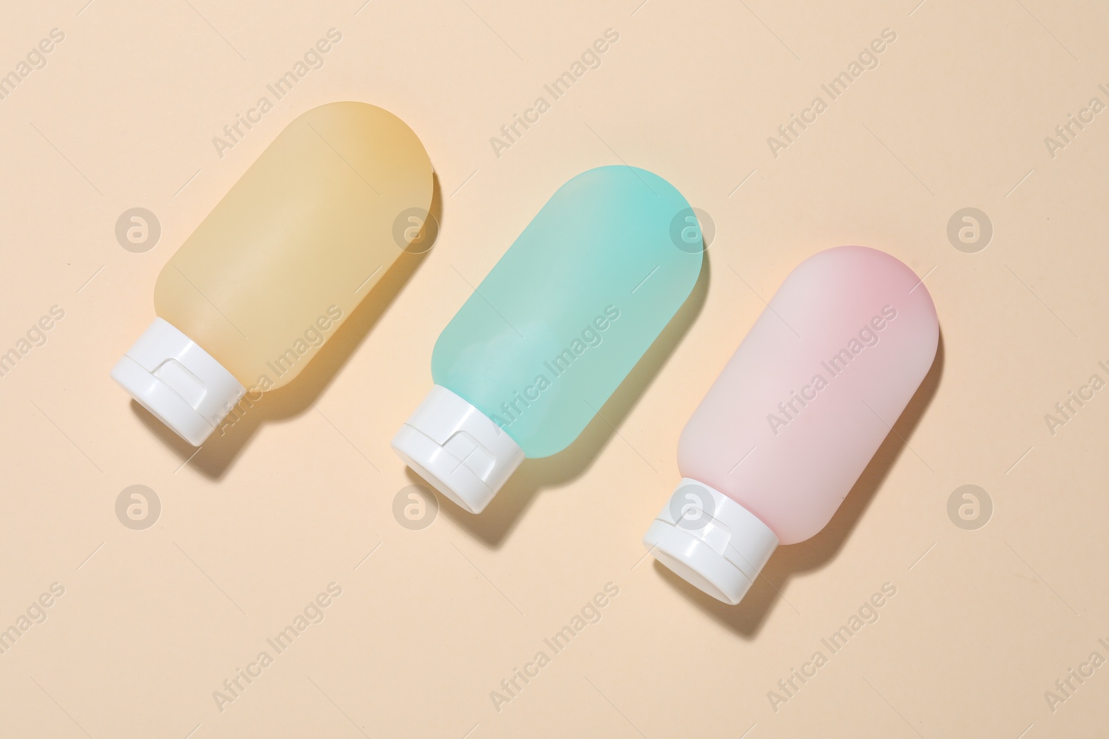 Cosmetic products on beige background, flat lay. Mockup for design Photo of Cosmetic products on beige background, flat lay. Mockup for design