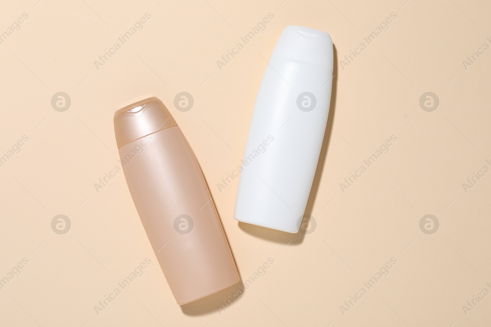 Cosmetic products on beige background, flat lay. Mockup for design Photo of Cosmetic products on beige background, flat lay. Mockup for design
