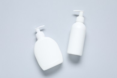 Photo of Cosmetic products on light background, flat lay. Mockup for design