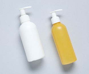Photo of Cosmetic products on light background, flat lay. Mockup for design