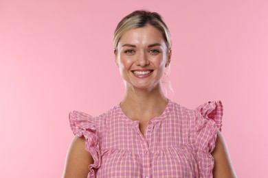 Photo of Woman with beautiful healthy teeth on pink background