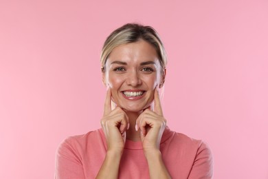 Photo of Woman with beautiful healthy teeth on pink background