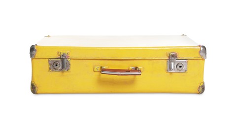 Photo of One yellow suitcase isolated on white. Used stuff