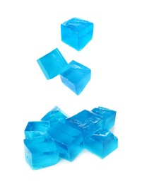 Image of Yummy blue jelly cubes falling on white background