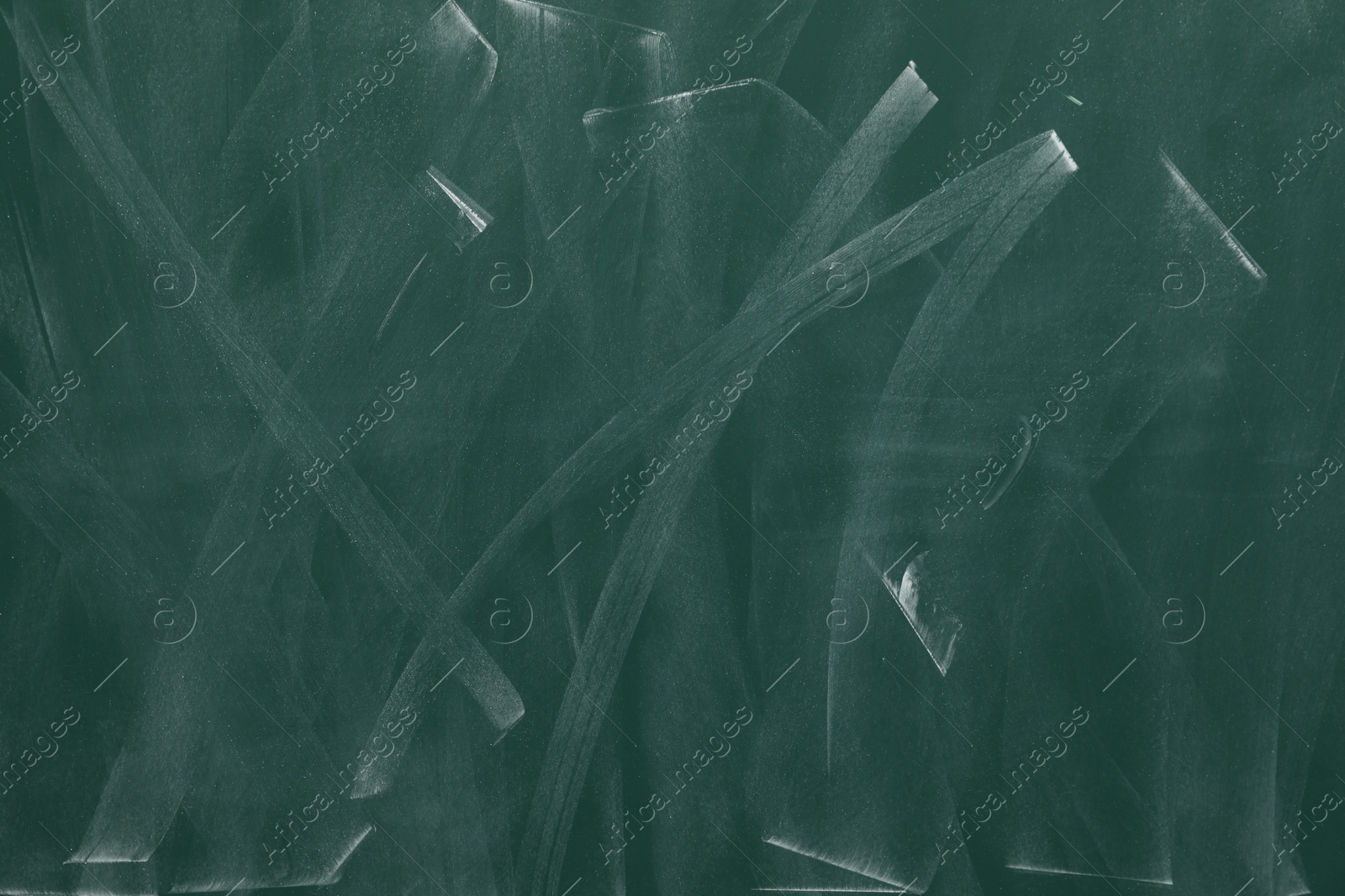 Dirty green chalkboard as background. School equipment Photo of Dirty green chalkboard as background. School equipment