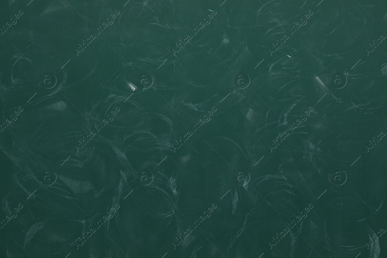 Dirty green chalkboard as background. School equipment Photo of Dirty green chalkboard as background. School equipment