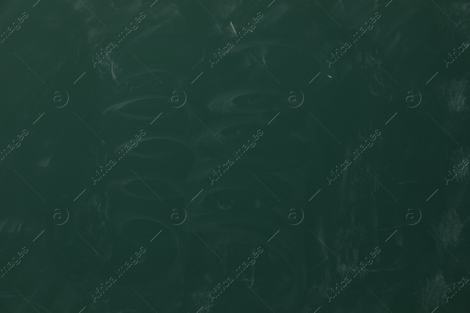 Dirty green chalkboard as background. School equipment Photo of Dirty green chalkboard as background. School equipment