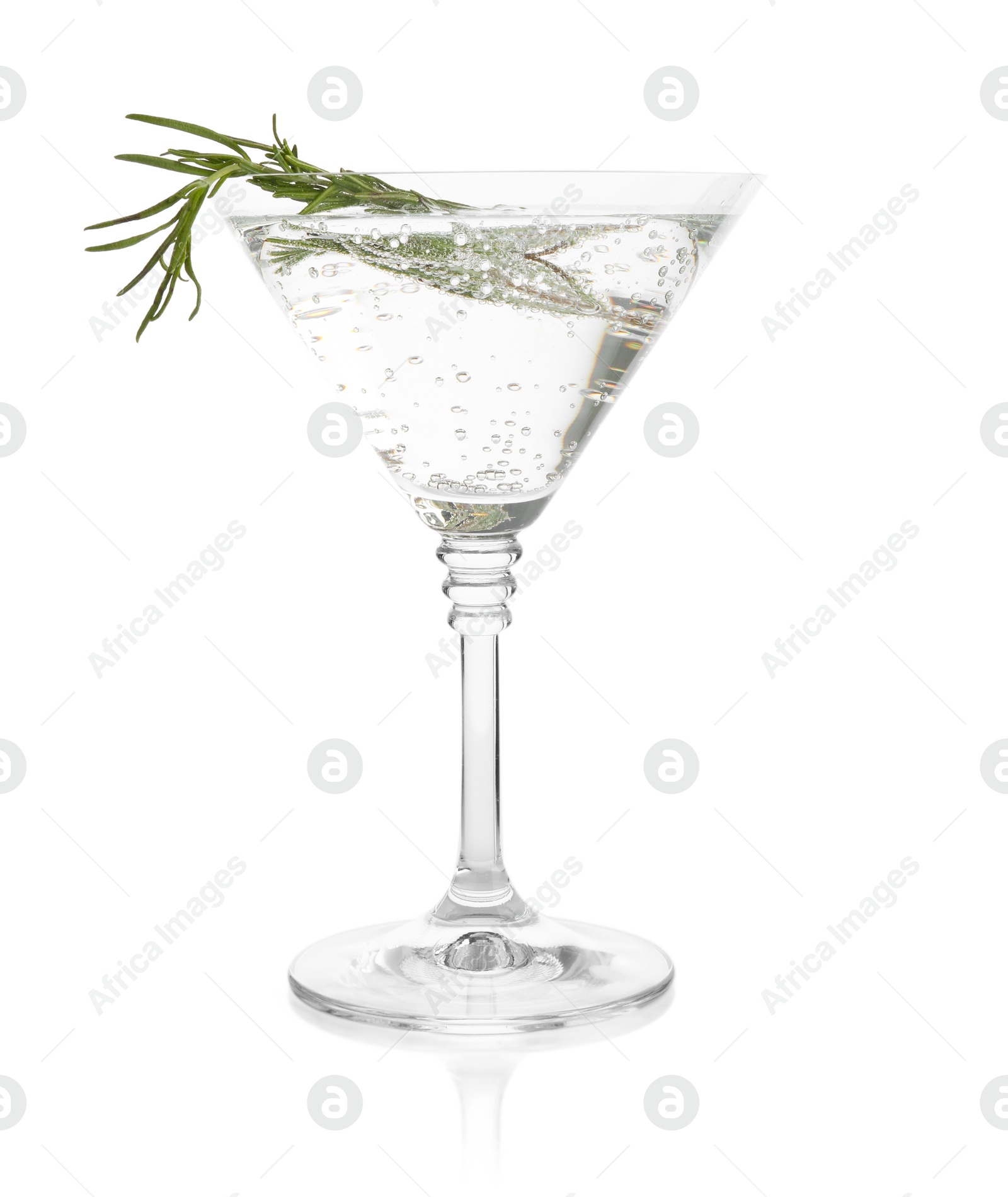 Martini cocktail with rosemary in glass on white background Photo of Martini cocktail with rosemary in glass on white background