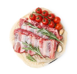 Photo of Fresh raw beef ribs, tomatoes and spices isolated on white, top view