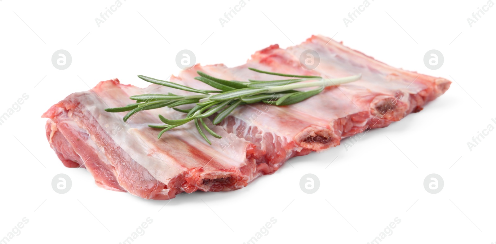 Photo of Fresh raw beef ribs and rosemary isolated on white