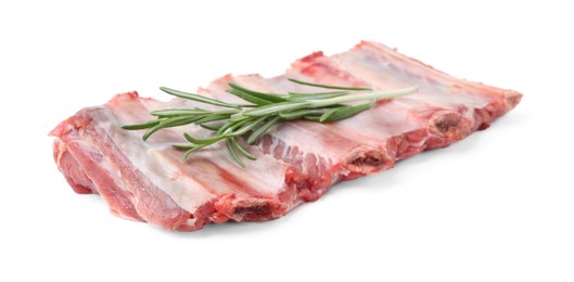 Photo of Fresh raw beef ribs and rosemary isolated on white