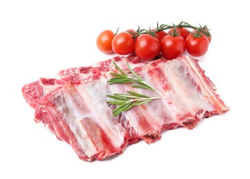 Photo of Fresh raw beef ribs, tomatoes and rosemary isolated on white