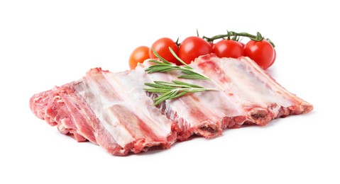 Photo of Fresh raw beef ribs, tomatoes and rosemary isolated on white
