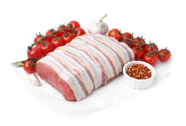 Photo of Piece of raw beef meat, tomatoes and spices isolated on white