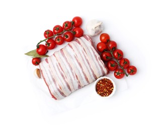 Photo of Piece of raw beef meat, tomatoes and spices isolated on white, top view