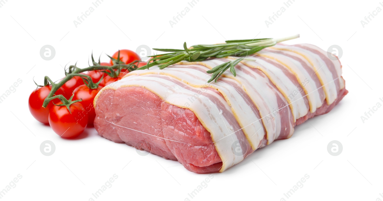 Piece of raw beef meat, tomatoes and rosemary isolated on white Photo of Piece of raw beef meat, tomatoes and rosemary isolated on white