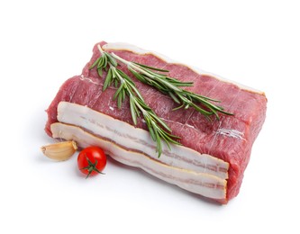 Photo of Piece of raw beef meat, tomato and spices isolated on white