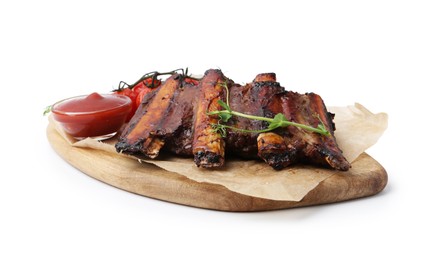 Photo of Roasted beef ribs with microgreens, tomatoes and sauce isolated on white