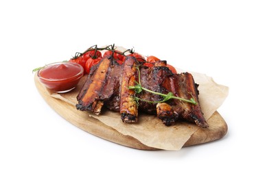 Photo of Roasted beef ribs with microgreens, tomatoes and sauce isolated on white